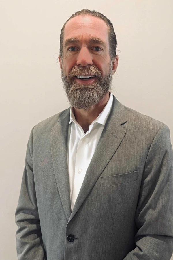 A portrait of Dr. Derrick Dauplaise
